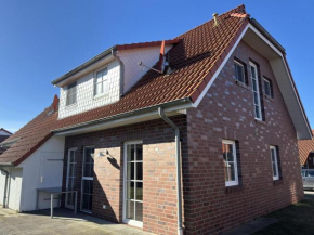 Doppelhaushälfte mit Kaminofen in Burhave